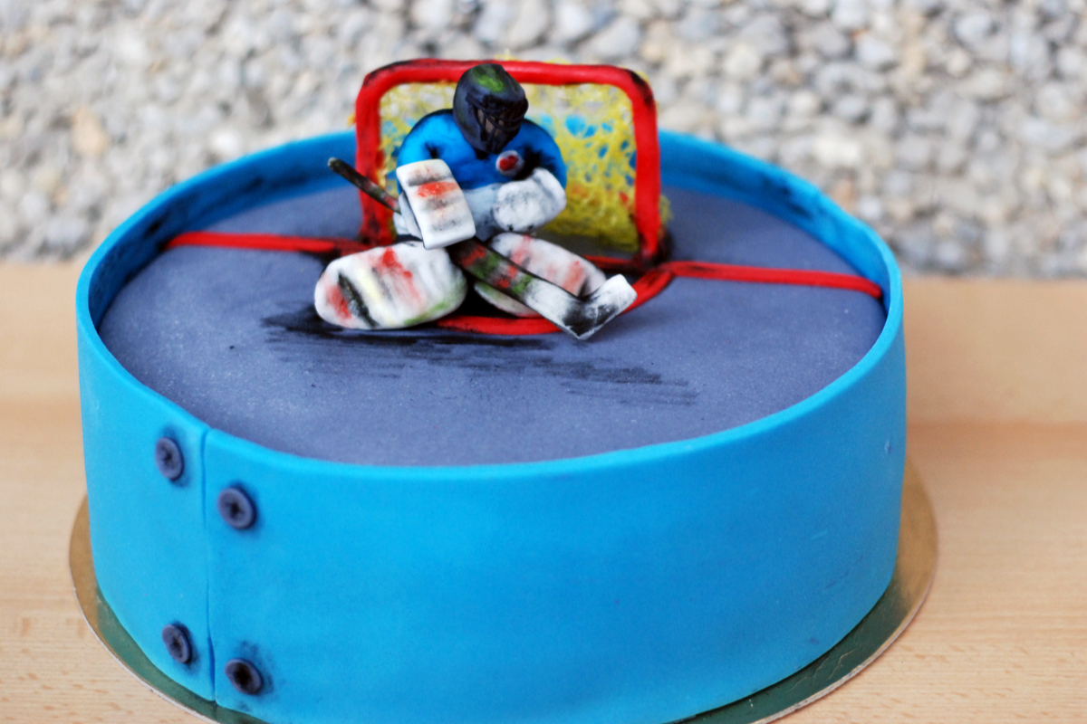 hockey birthday cake for a sports-themed birthday party