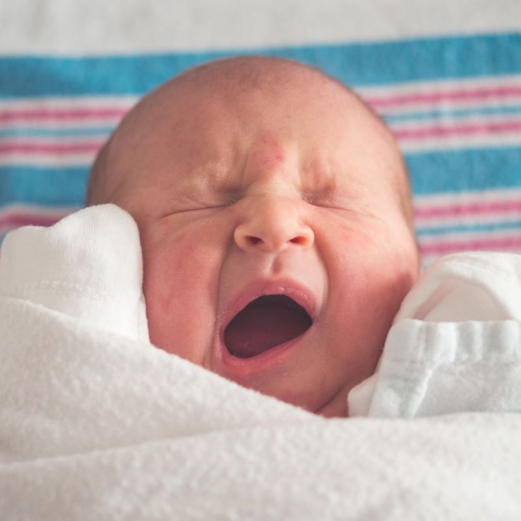 Newborn yawning or crying