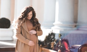 pregnant woman in coat