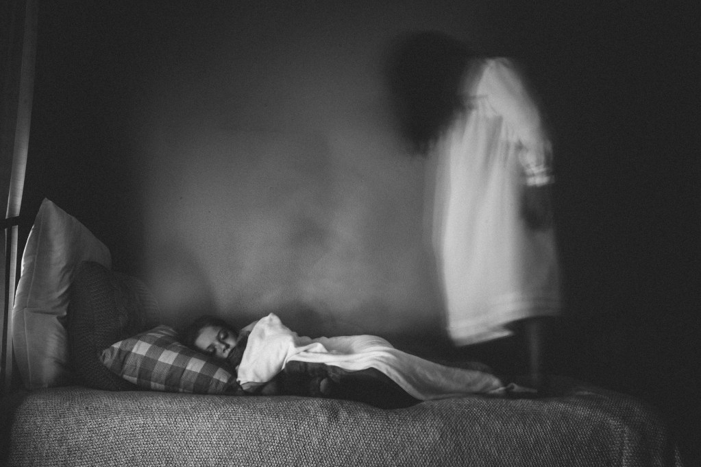 Ghost appearing over child's bed