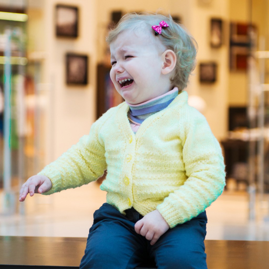 A toddler crying in a store.