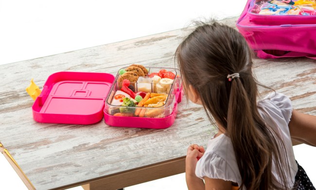A child eating her school lunch