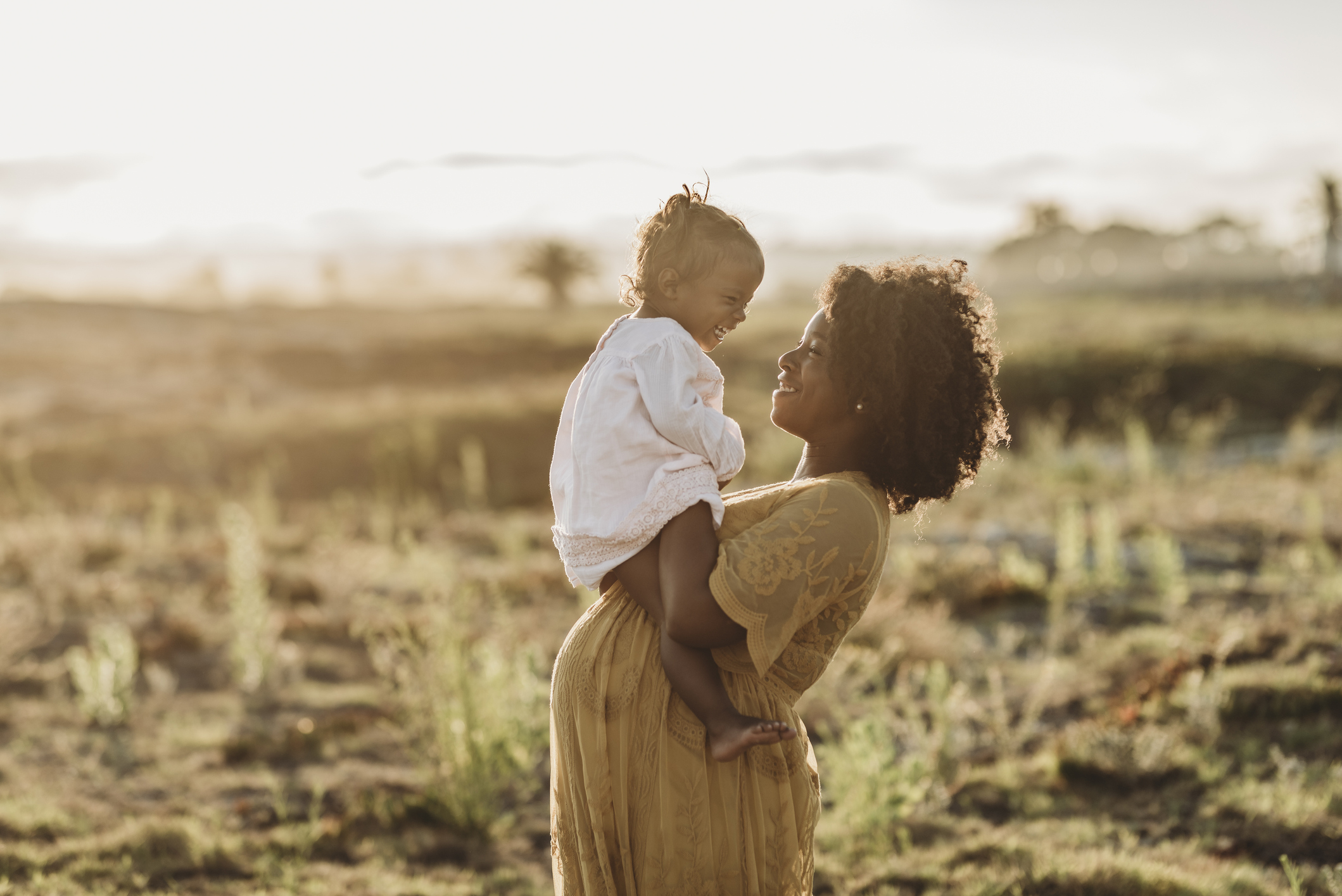 Pregnant Black mother and child