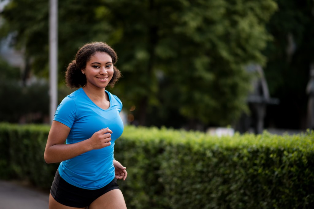 Teenage girl jogging