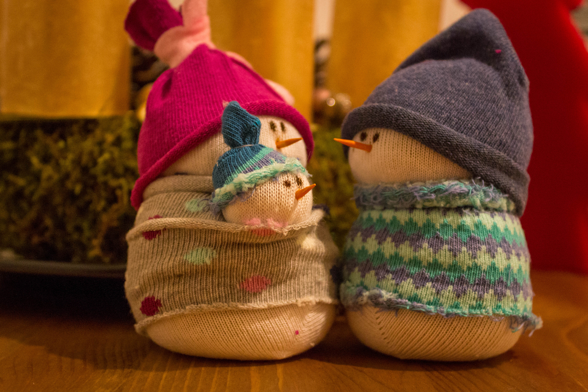 Felt toy snow family pieces.