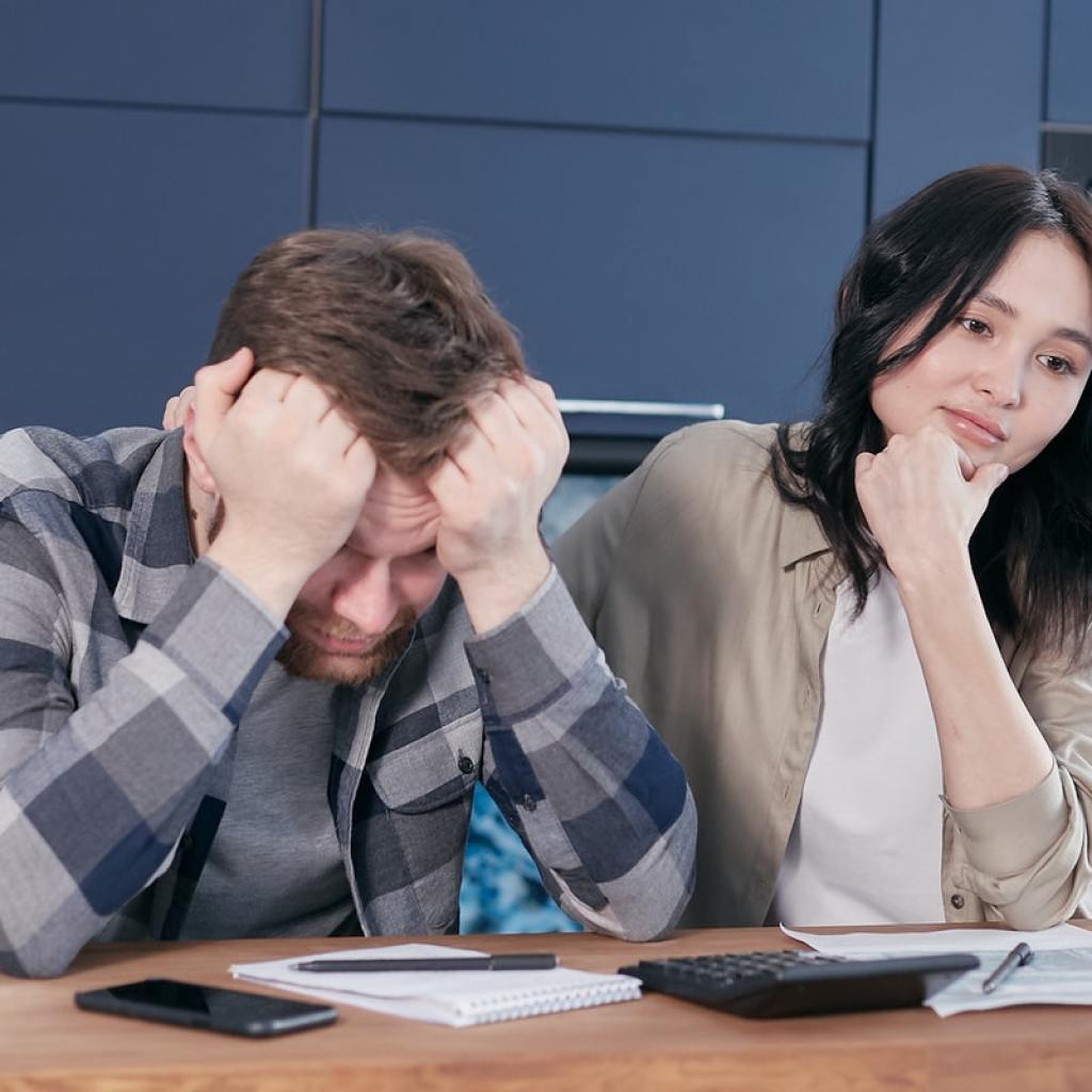 Couple worrying about finances
