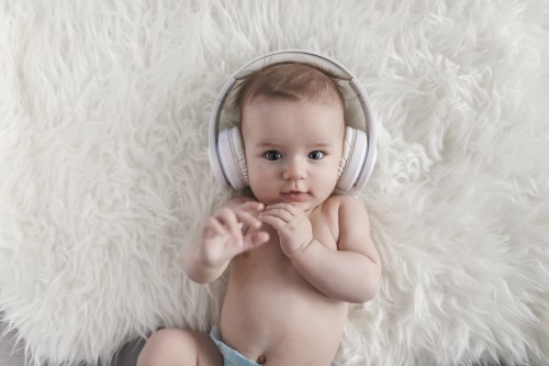 Baby listening to headphones.