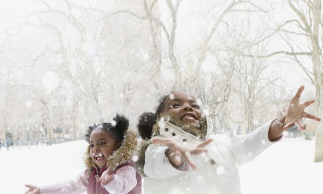 Kids enjoying snow as an outdoor activity