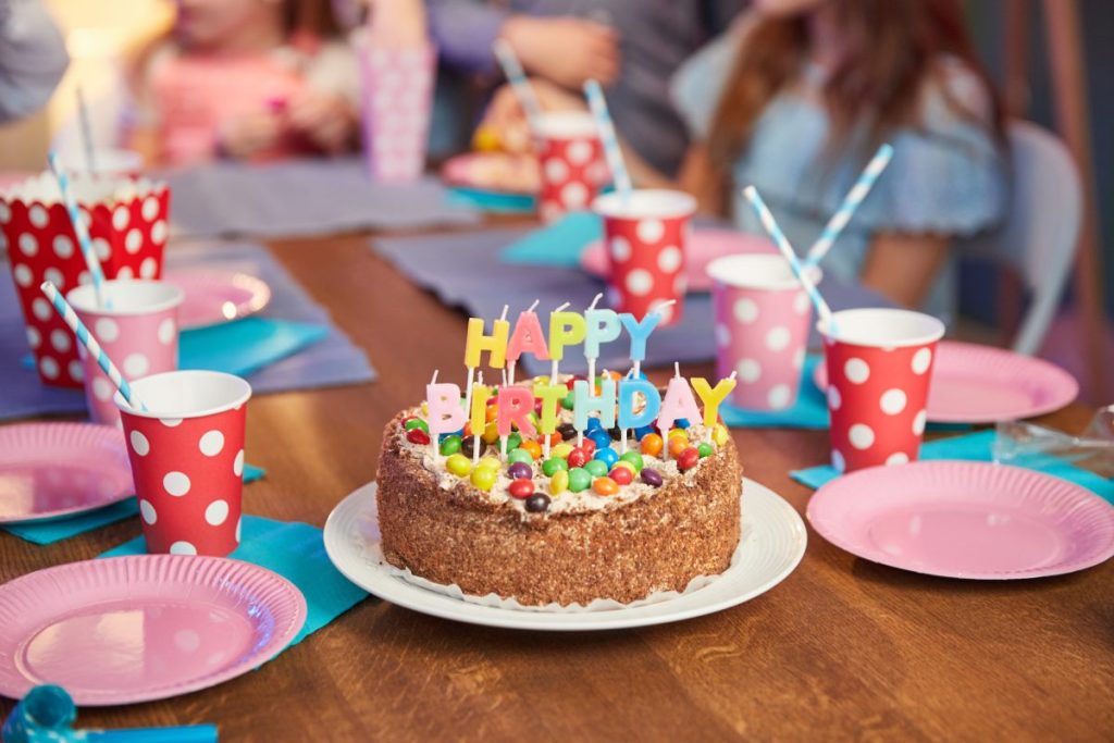 Delicious birthday cake with candles