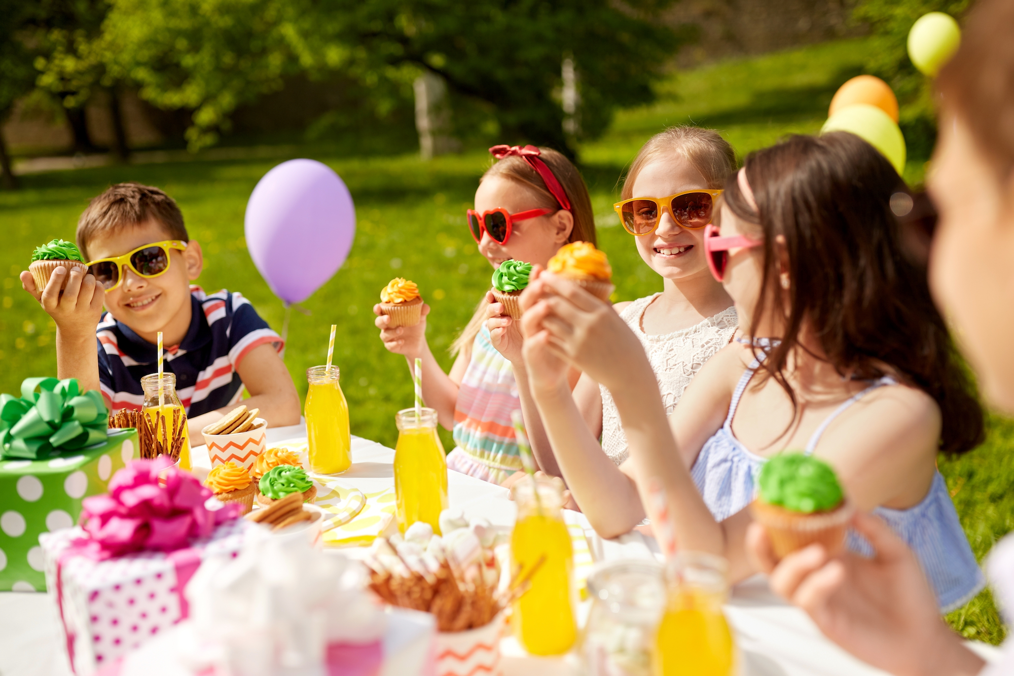 Teens at outdoor birthday party