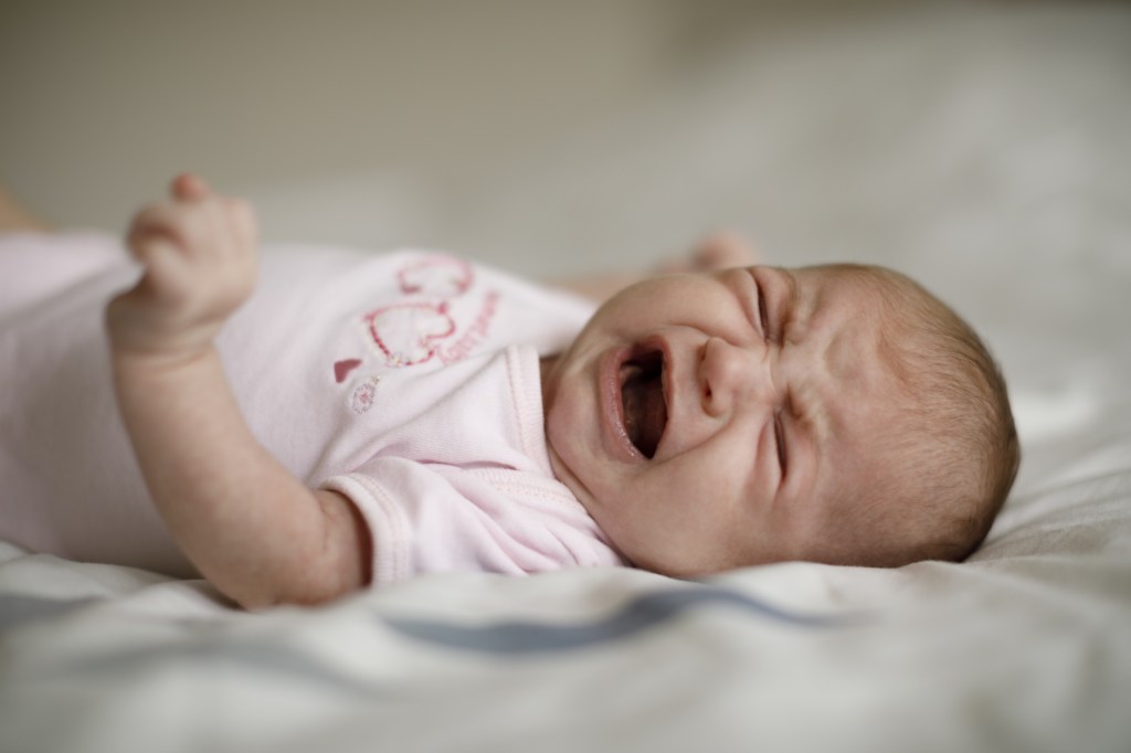 Newborn baby girl crying