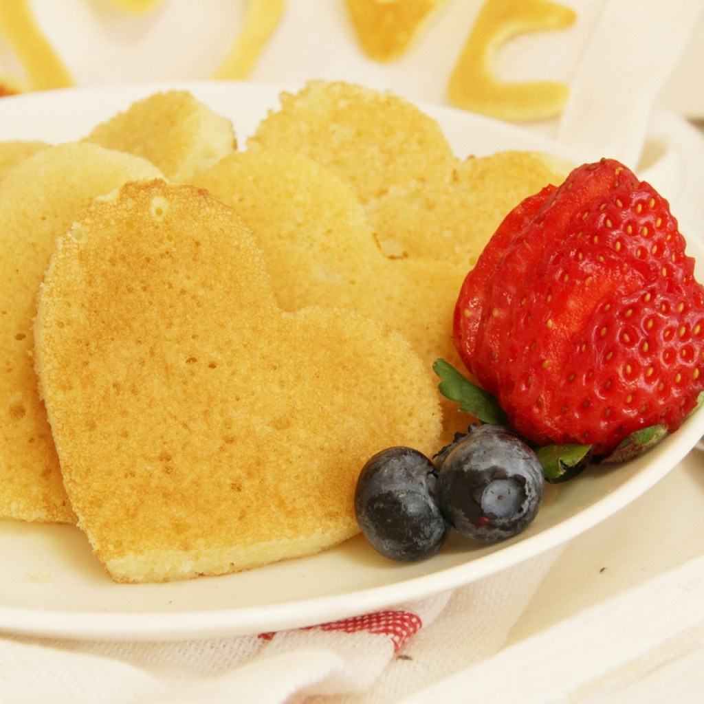 Plate of heart-shaped pancakes for Valentine's Day