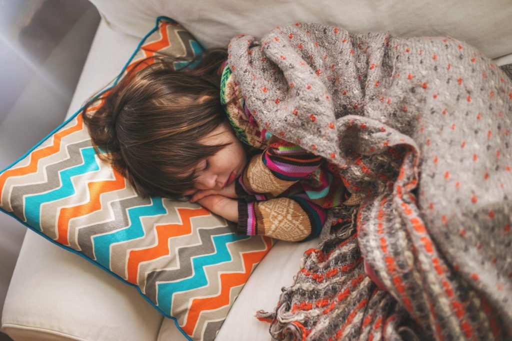 Child sleeping on the couch