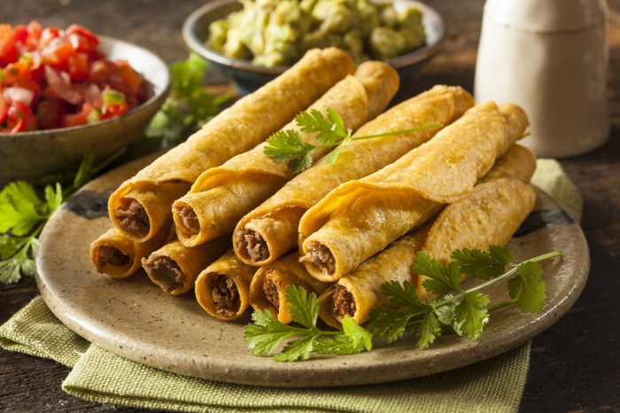 plate of beef taquitos ready to eat