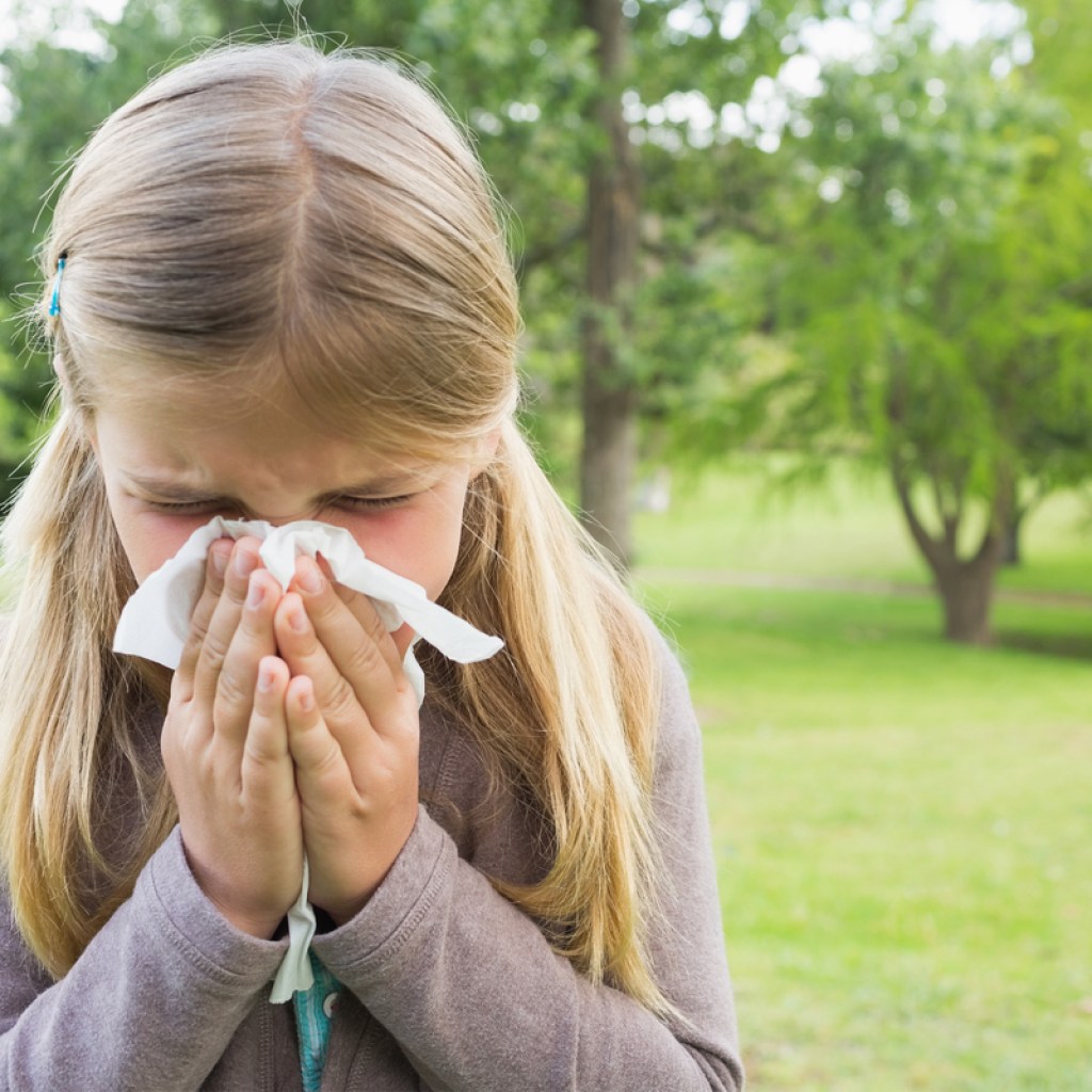 young girls suffering from seasonal allergy symptoms