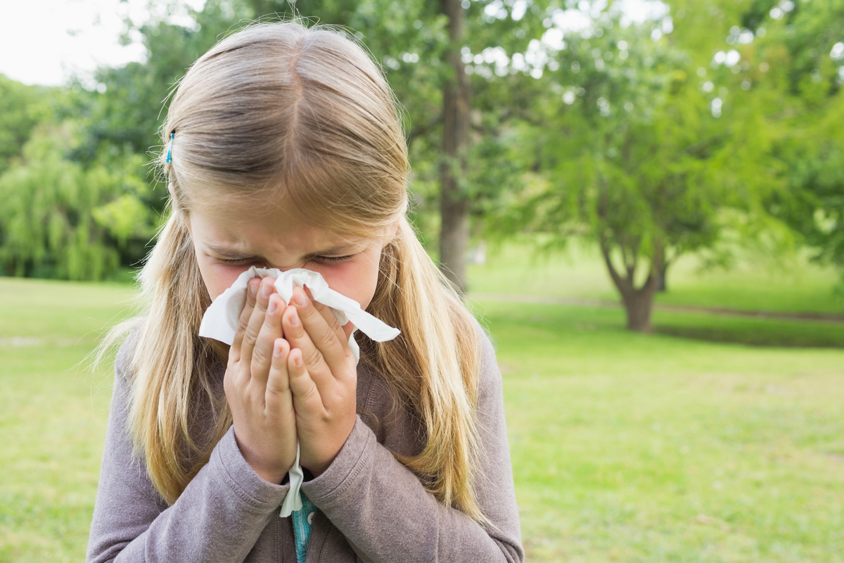 young girls suffering from seasonal allergy symptoms