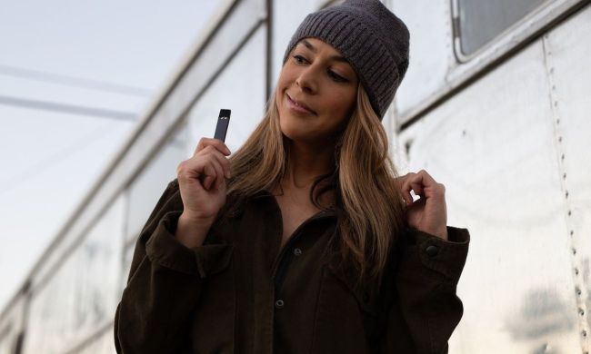 Teen girl holding an e-cigarette
