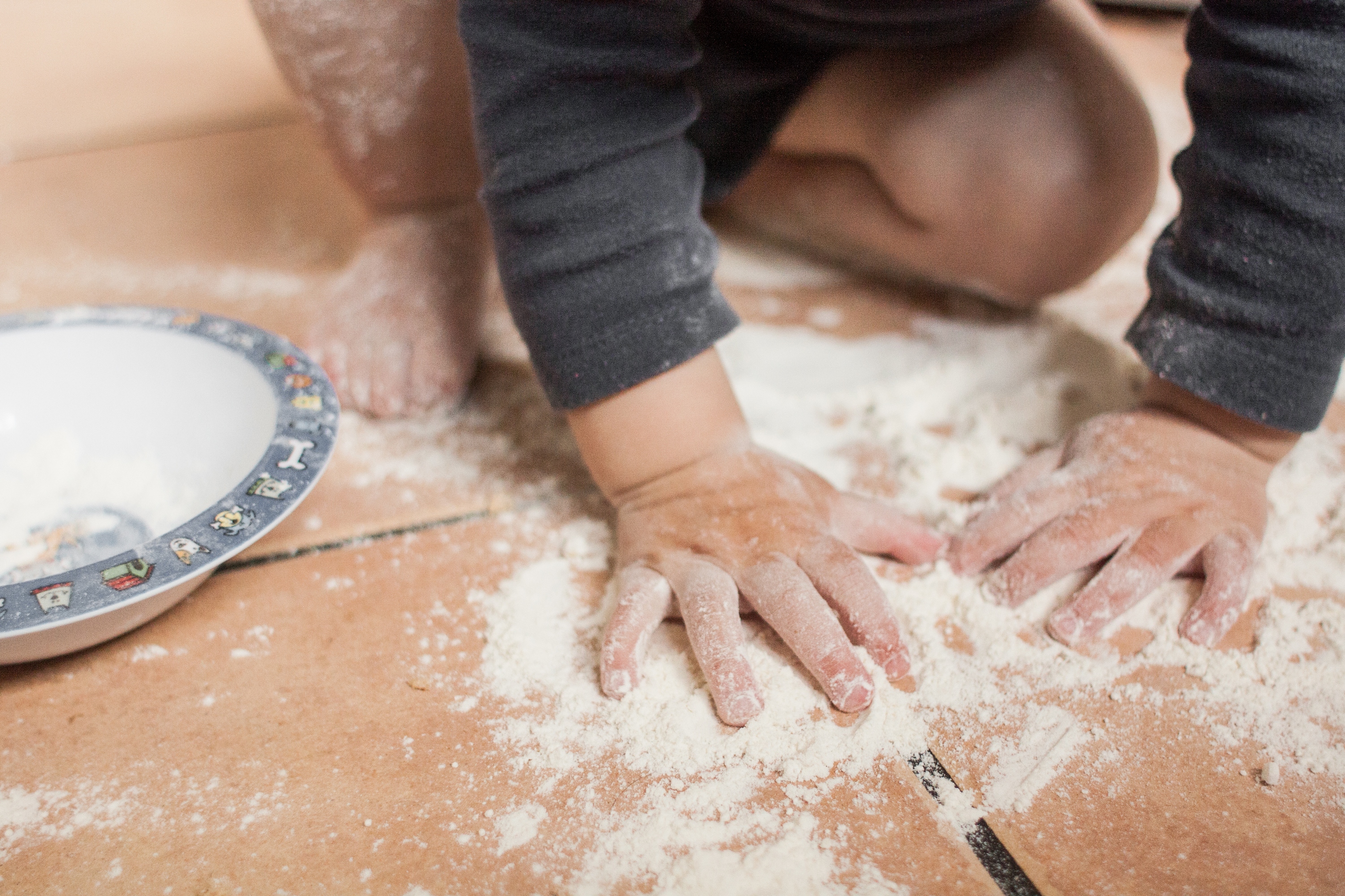 Child playing in flour