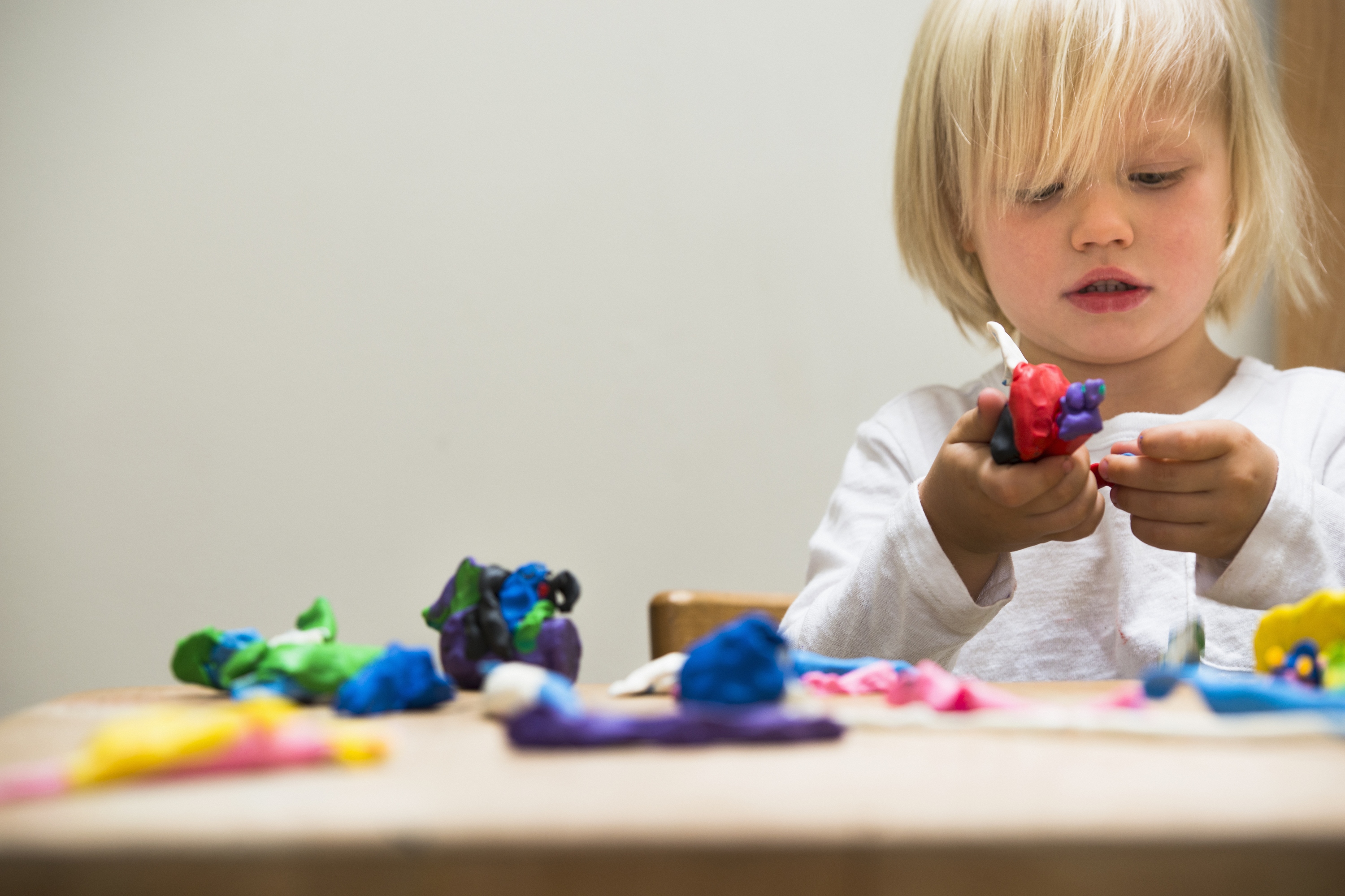 child using clay