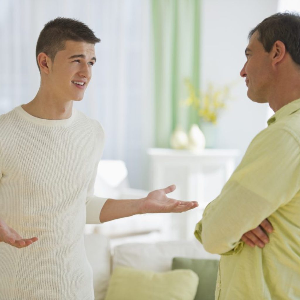 A father and son having a deep discussion.
