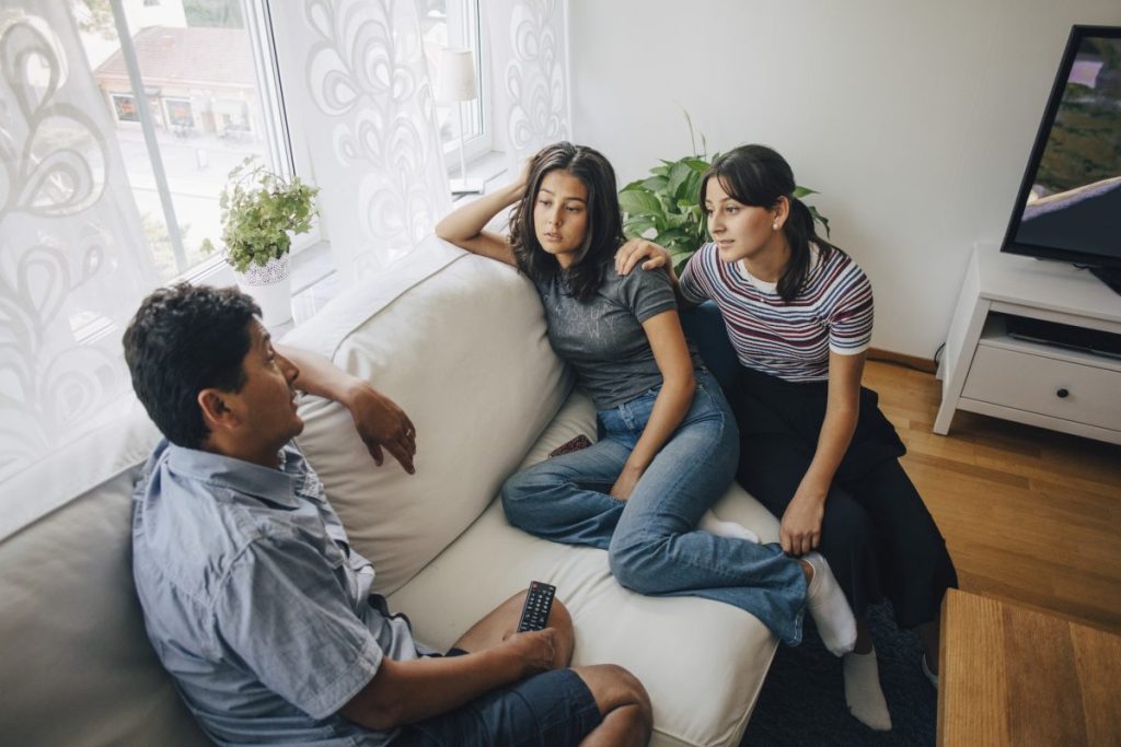 Parents having a talk with their teen.