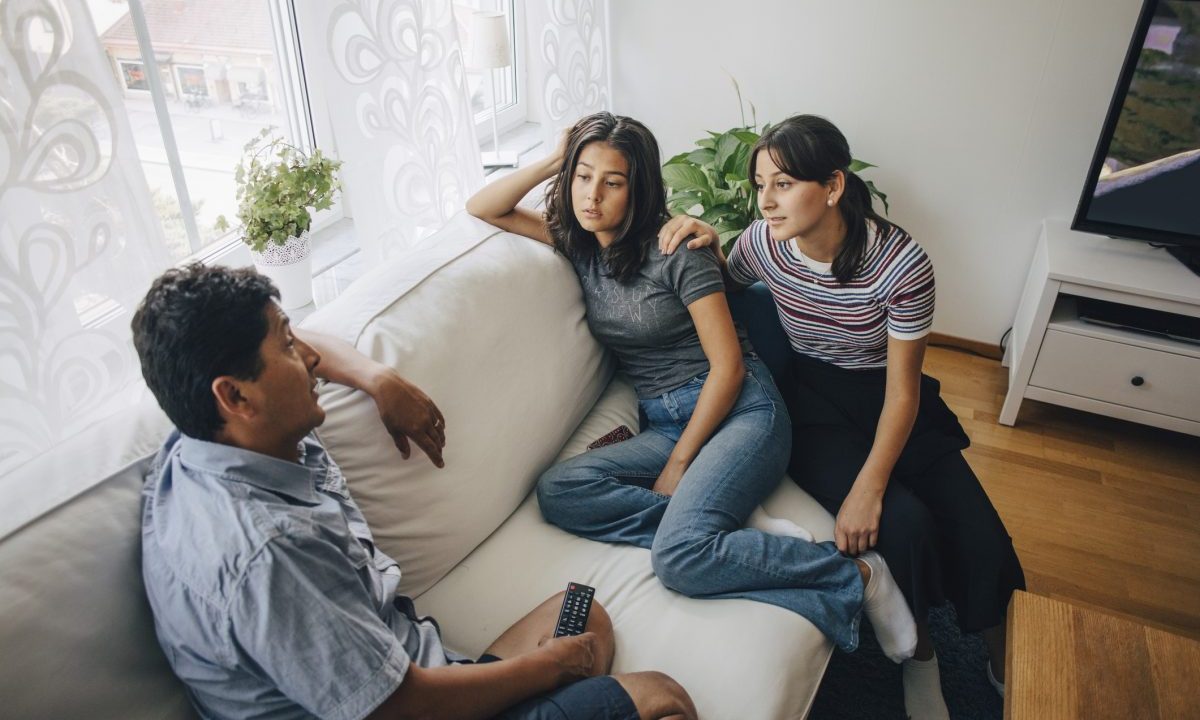 Parents having a talk with their teen