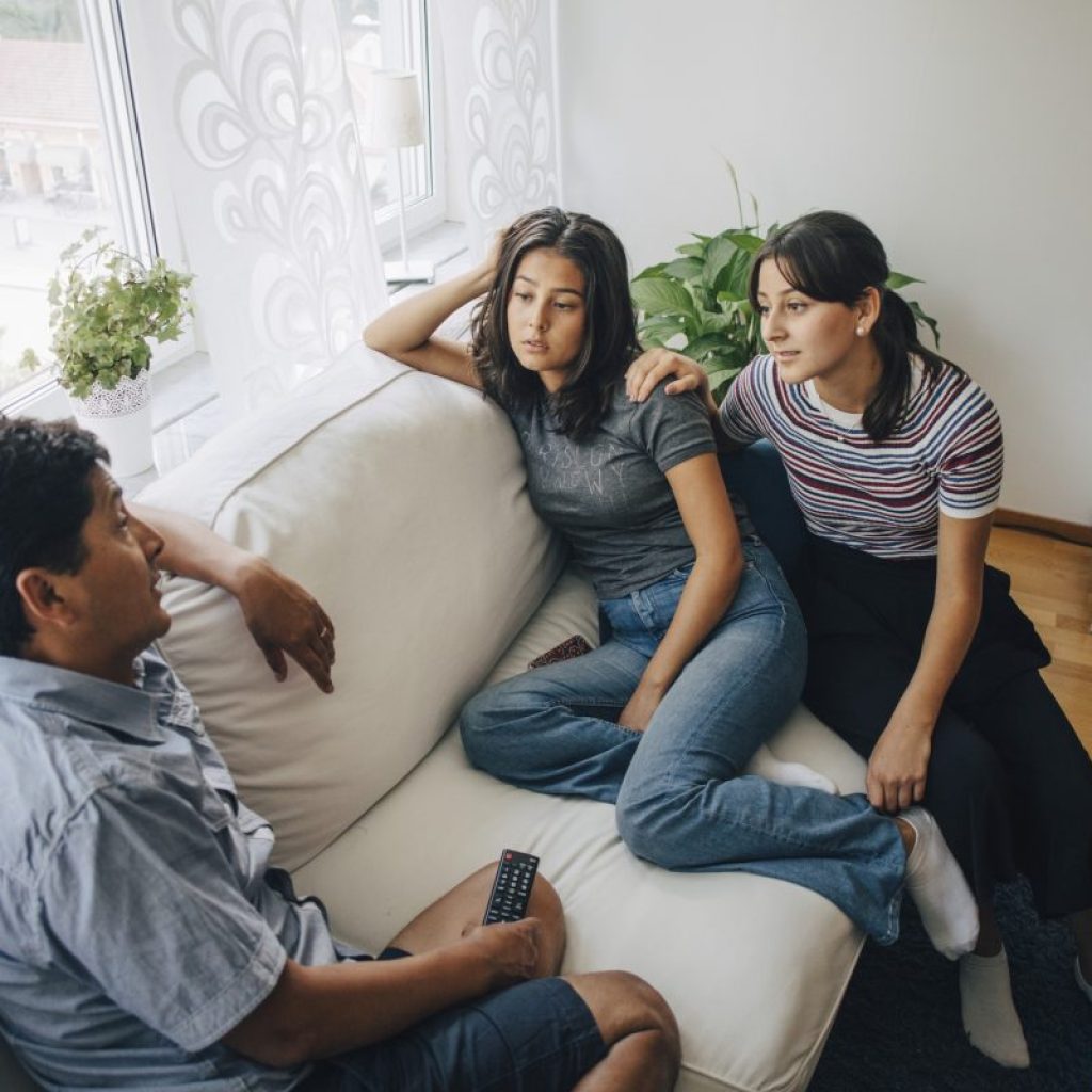 Parents having a talk with their teen.