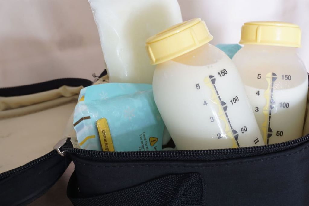 milk storage containers in diaper bag