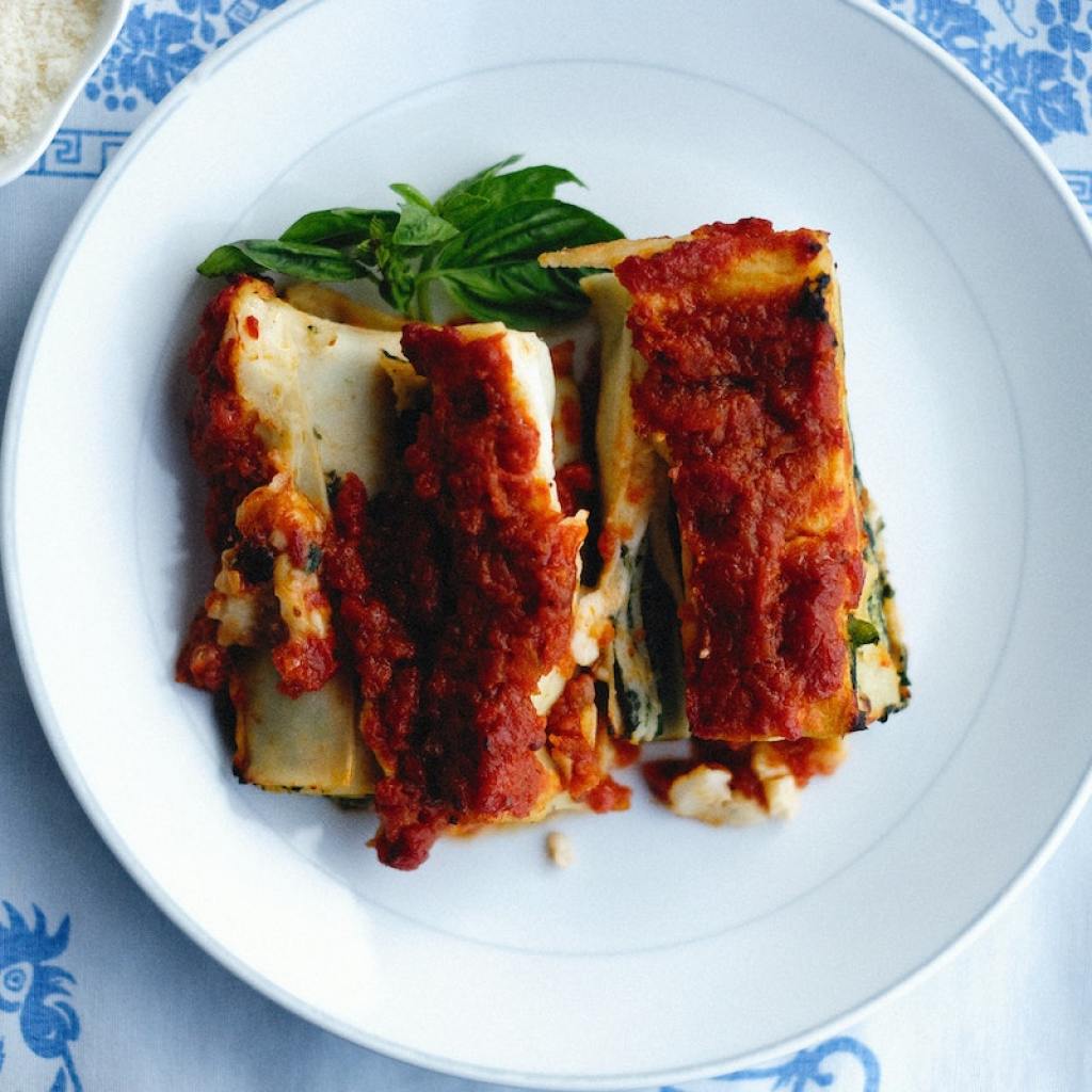 Lasagna roll-ups on a white plate