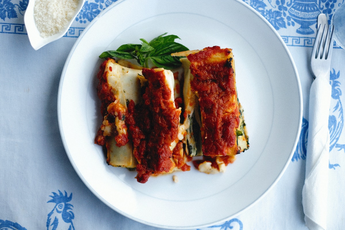 Lasagna roll-ups on a white plate
