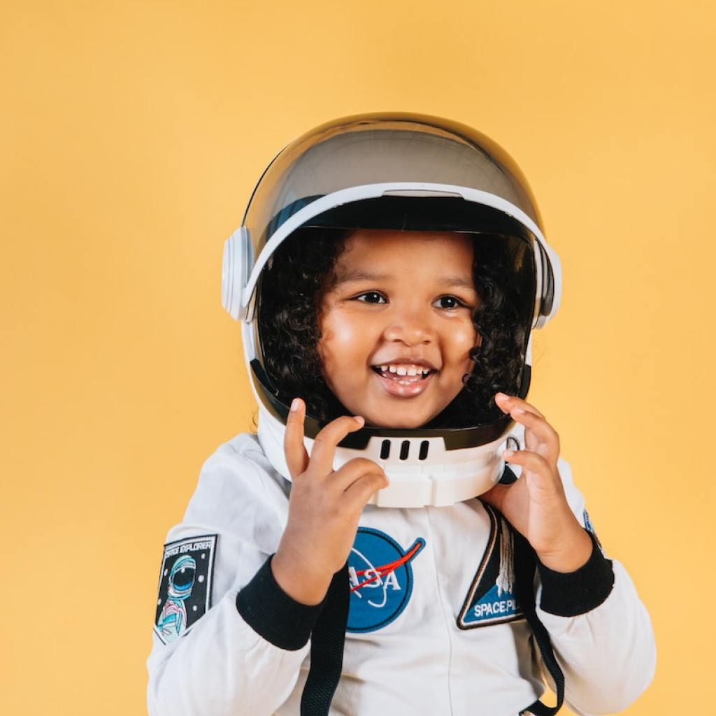 Little girl in an astronaut costume
