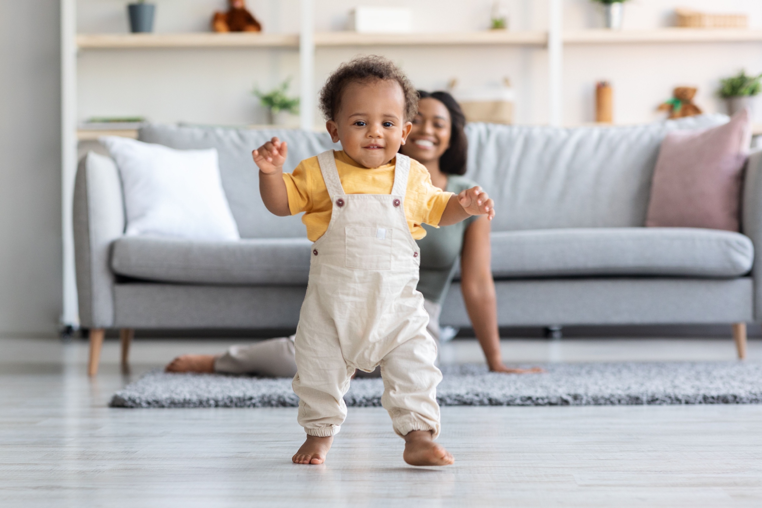 Toddler boy walking around.