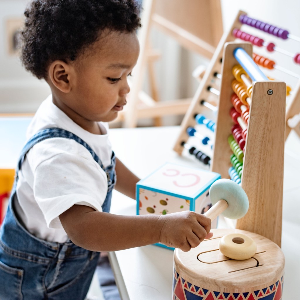 Toddler boy playing