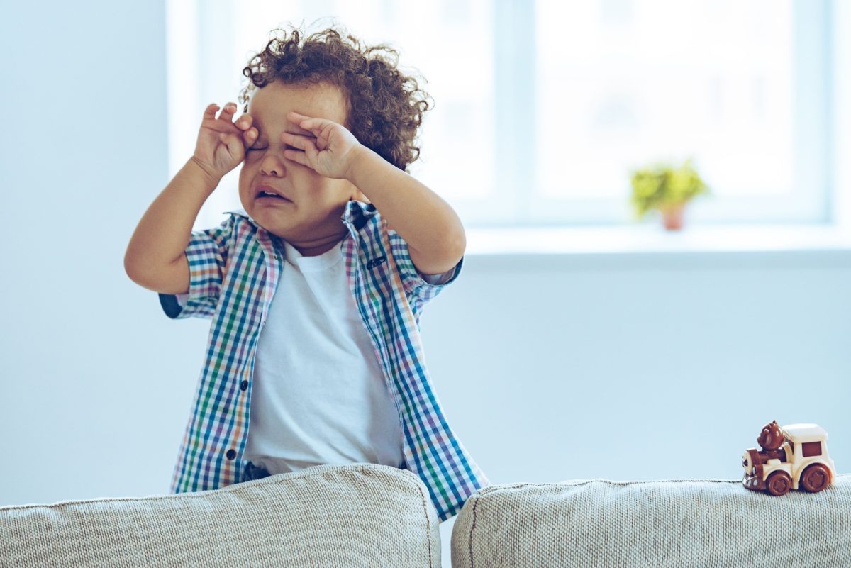 A toddler crying in their room.