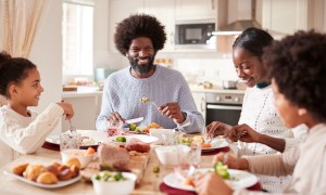 Family listens to music at mealtime