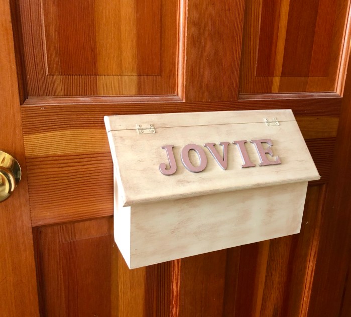 DIY mailbox on a bedroom door