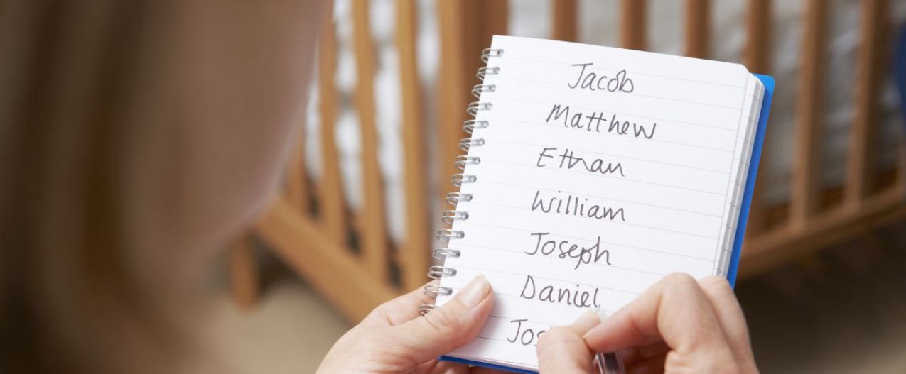 Pregnant mom making a list of boy names
