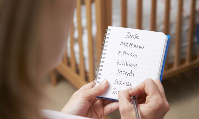 Pregnant mom making a list of boy names