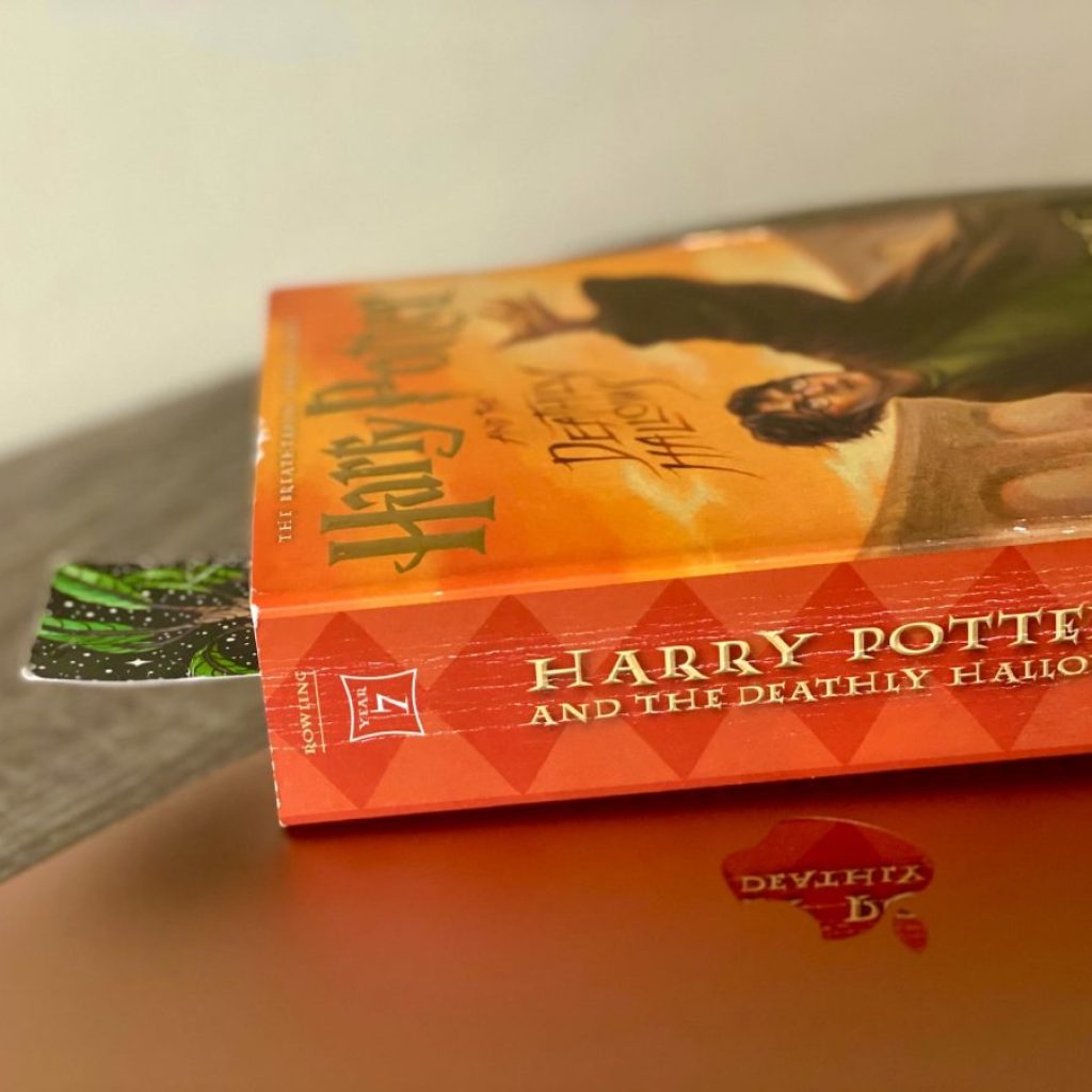 A Harry Potter book sitting on a desk