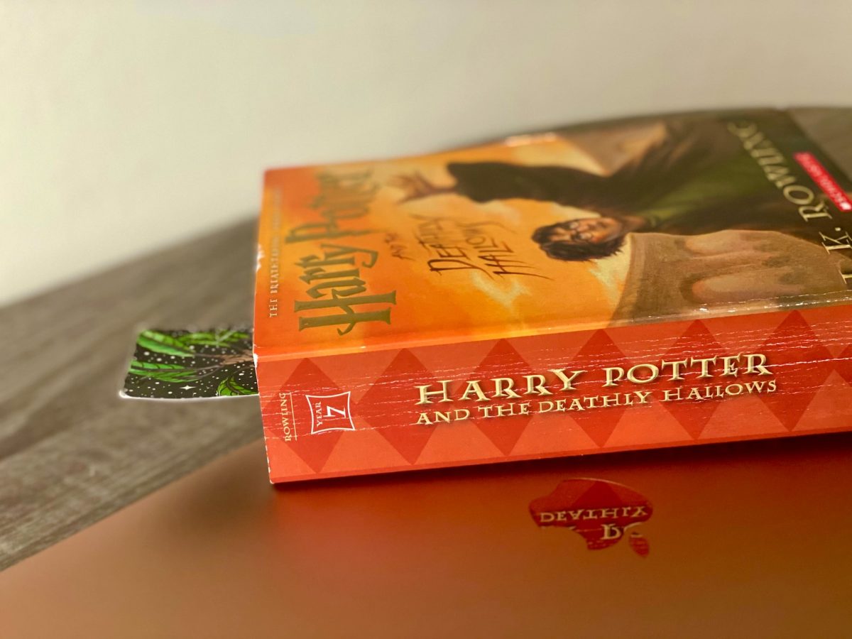 A Harry Potter book sitting on a desk
