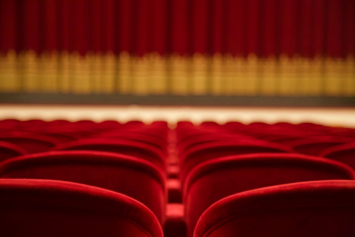 Talent show stage with empty audience seats