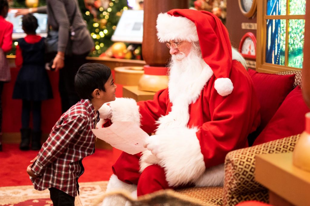 A child approaching Santa.