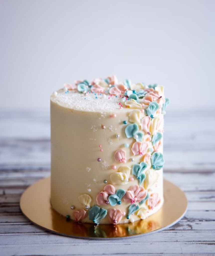 beautifully decorated gender reveal cake