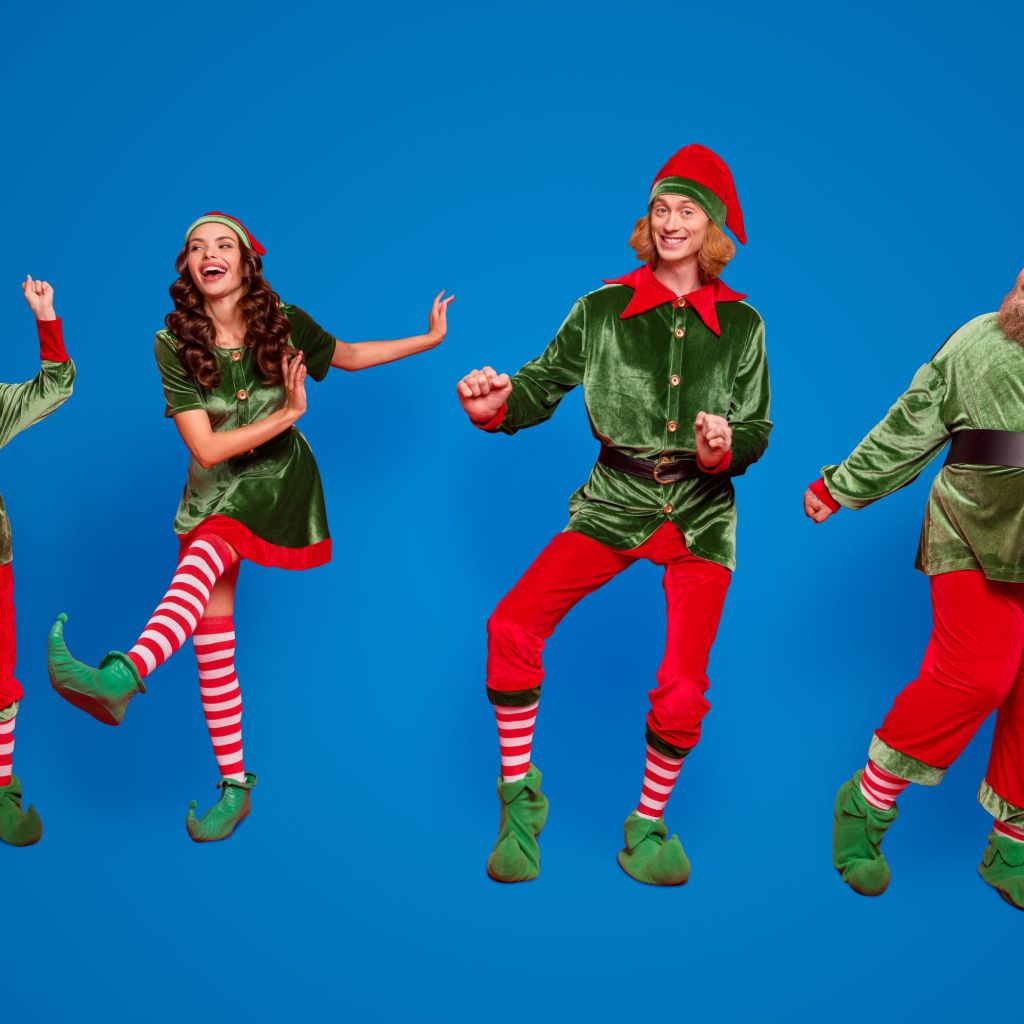 Family of 4 in Christmas costumes