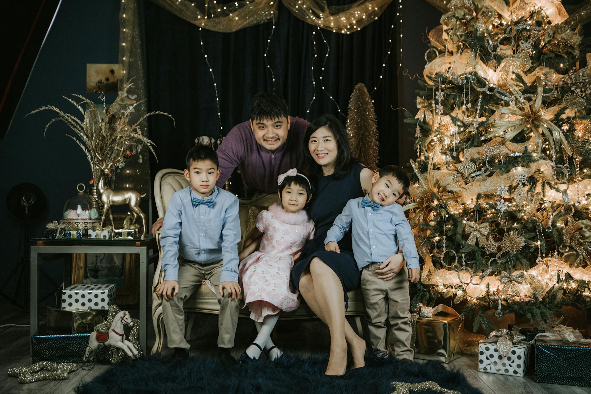 Family posing for Christmas pictures