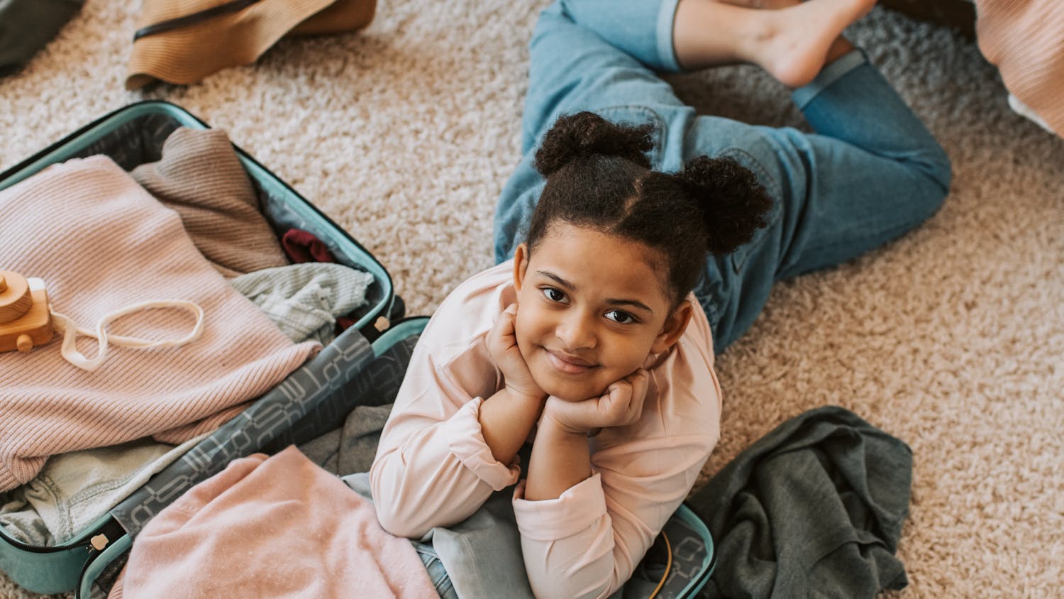 A child packing for a trip.