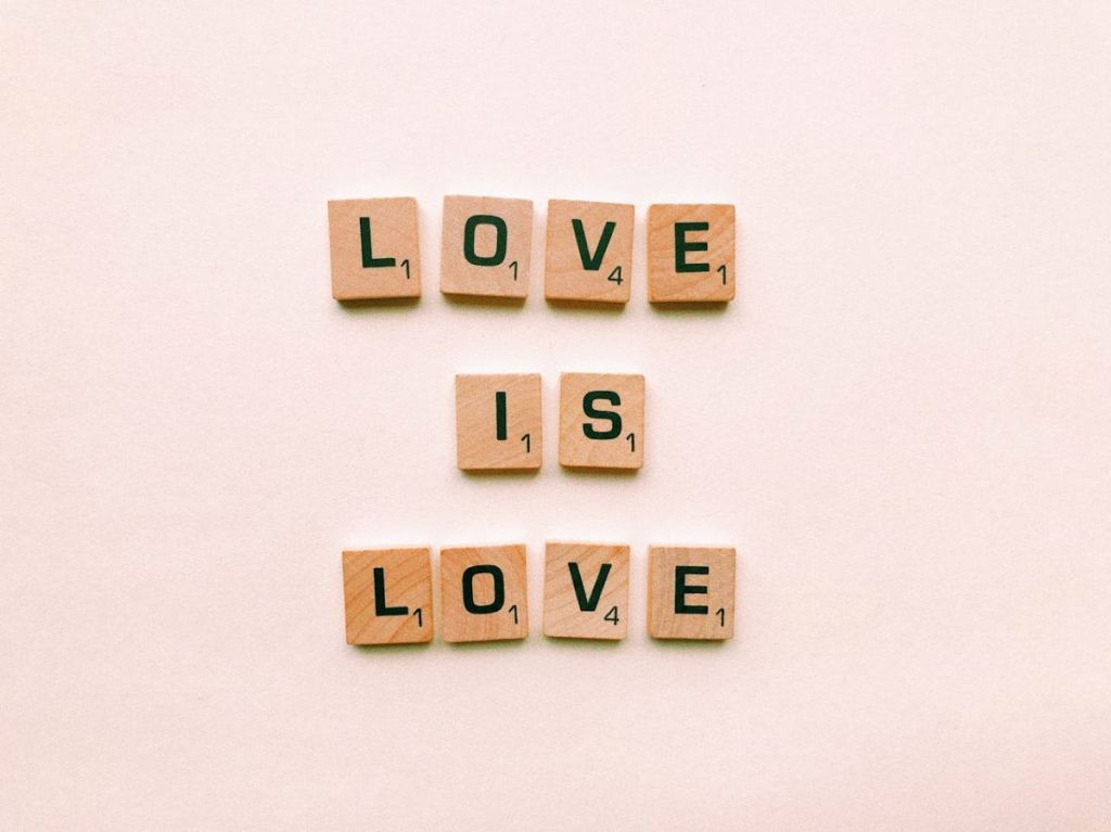 Love is love spelled out in Scrabble tiles