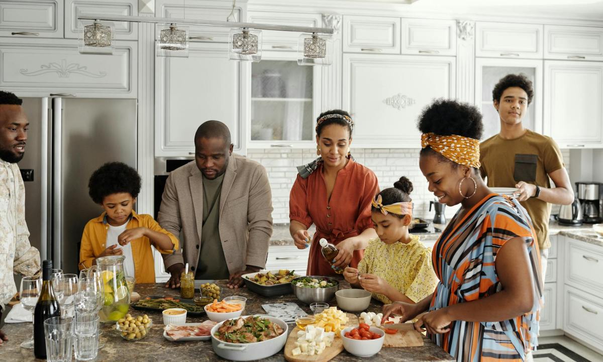family gathering around kitchen counter for a meal