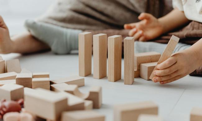 A child playing with stacking blocks